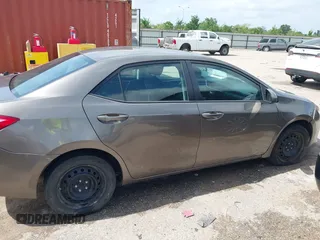2018 Toyota Corolla L z VIN 5YFBURHE1JP855556, wystawiony jako IAAI lot #42273685 z przebiegiem 165 792 mil mil oraz . Historia ofert i sprzedaży dostępna na DreamBid. Obrazek 13.
