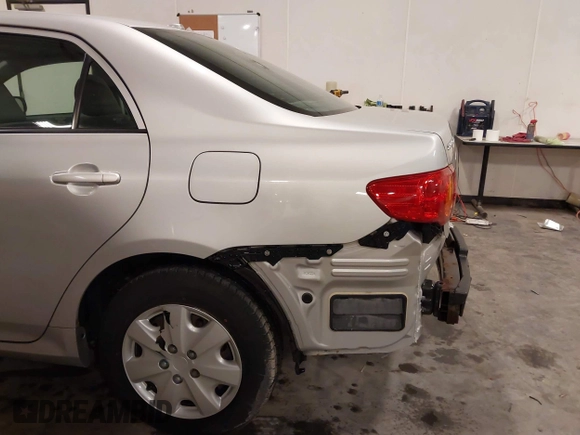 2009 Toyota Corolla with VIN 1NXBU40E69Z129314, listed as a IAAI auction lot 41718098 with 170,739 mi miles. Bid and sale history available at carsss.com. Image 6.