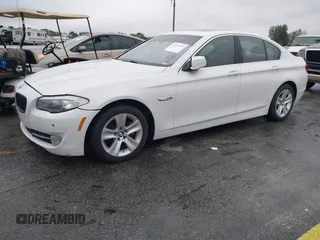 2012 BMW 5 Series 528i with VIN WBAXG5C55CDW85766, listed as a IAAI auction lot 41373727 with 105,056 mi miles. Bid and sale history available at carsss.com. Image 2.