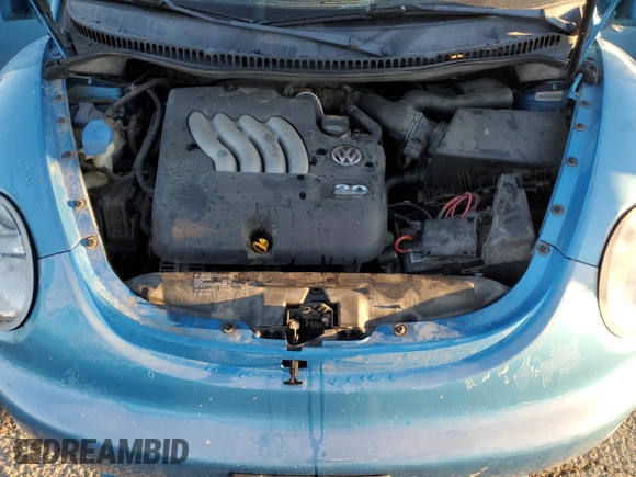 2004 Volkswagen New Beetle Coupe Satellite Blue with VIN 3VWGK31CX4M419900, listed as a Copart auction lot 41627155 with 129,510 mi miles and Salvage Title. Bid and sale history available at carsss.com. Image 12.