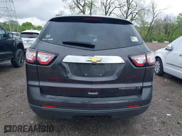 2015 Chevrolet Traverse LS z VIN 1GNKRFKDXFJ107942, wystawiony jako IAAI lot #42111246 z przebiegiem 128 036 mil mil oraz . Historia ofert i sprzedaży dostępna na DreamBid. Obrazek 16.