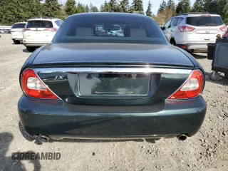 2008 Jaguar XJ with VIN SAJWA79BX8SH23430, listed as a Copart auction lot 51990785 with 140,454 mi miles and Salvage Title. Bid and sale history available at carsss.com. Image 6.