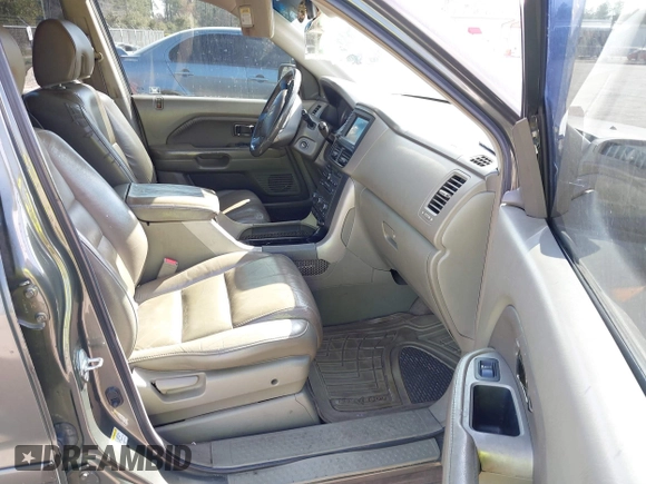 2006 Honda Pilot EX-L with VIN 2HKYF18786H506289, listed as a IAAI auction lot 41507906 with 283,470 mi miles and . Bid and sale history available at DreamBid. Image 5.