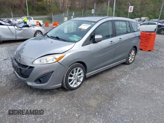 2012 Mazda 5 Touring with VIN JM1CW2CLXC0100740, listed as a IAAI auction lot 41918794 with 234,102 mi miles and . Bid and sale history available at DreamBid. Image 2.