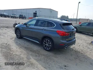 2020 BMW X1 xDrive28i with VIN WBXJG9C08L5R71788, listed as a IAAI auction lot 42604792 with 46,489 mi miles and . Bid and sale history available at DreamBid. Image 3.