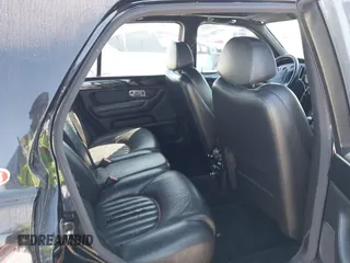 2001 Bentley Arnage with VIN SCBLC31E11CX06297, listed as a IAAI auction lot 41980275 with 63,510 mi miles and . Bid and sale history available at DreamBid. Image 8.