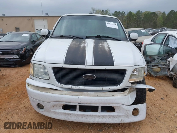 2003 Ford F-150 with VIN 2FTRF07W43CA38120, listed as a IAAI auction lot 41944774 with 195,327 mi miles and . Bid and sale history available at DreamBid. Image 12.