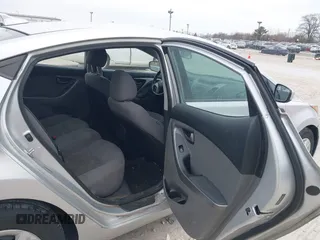 2016 Hyundai Elantra SE with VIN 5NPDH4AE7GH728956, listed as a IAAI auction lot 42060018 with 199,829 mi miles. Bid and sale history available at carsss.com. Image 8.