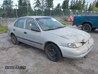 1999 Chevrolet Prizm z VIN 1Y1SK5281XZ427093, wystawiony jako IAAI lot #42251187 z przebiegiem 265 955 mil mil oraz . Historia ofert i sprzedaży dostępna na DreamBid. Obrazek 1.