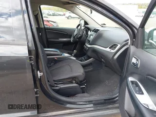 2013 Dodge Journey SXT with VIN 3C4PDDBG7DT553130, listed as a IAAI auction lot 40570369 with Not Provided miles and . Bid and sale history available at DreamBid. Image 5.