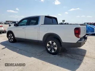 2020 Honda Ridgeline RTL with VIN 5FPYK3F57LB031244, listed as a Copart auction lot 58863795 with 54,318 mi miles and Salvage title. Bid and sale history available at DreamBid. Image 2.