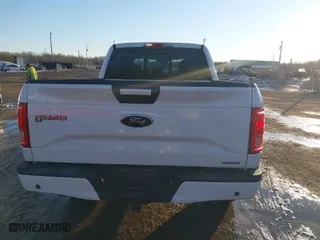 2015 Ford F-150 XLT w/HD Payload Pkg with VIN 1FTFW1EF6FFC66723, listed as a IAAI auction lot 41303476 with 203,999 mi miles. Bid and sale history available at carsss.com. Image 16.
