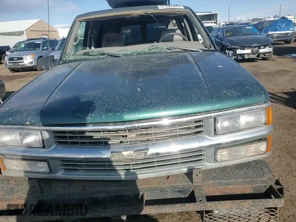 1997 Chevrolet Suburban with VIN 3GNFK16R6VG133792, listed as a Copart auction lot 51287445 with 180,437 mi miles and Salvage Title. Bid and sale history available at carsss.com. Image 12.