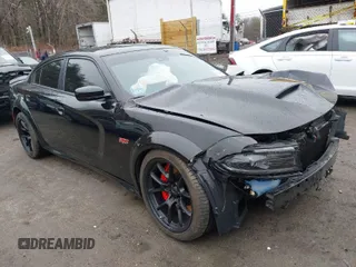 2022 Dodge Charger Scat Pack Widebody with VIN 2C3CDXGJ3NH178100, listed as a IAAI auction lot 41666082 with 17,224 mi miles and . Bid and sale history available at carsss.com. Image 1.