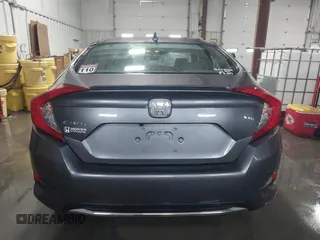 2020 Honda Civic EX-L with VIN 19XFC1F70LE010163, listed as a IAAI auction lot 41306532 with 88,767 mi miles and . Bid and sale history available at DreamBid. Image 16.