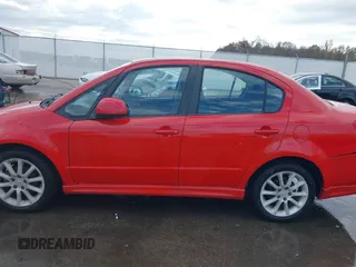 2009 Suzuki SX4 Sport FWD with VIN JS2YC414596200021, listed as a IAAI auction lot 40753192 with 144,805 mi miles and . Bid and sale history available at DreamBid. Image 14.
