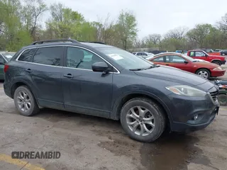 2015 Mazda CX-9 Touring with VIN JM3TB3CA3F0460864, listed as a IAAI auction lot 41944957 with 242,100 mi miles. Bid and sale history available at carsss.com. Image 13.