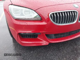 2013 BMW 6 Series 650i with VIN WBAYM9C53DDW20243, listed as a IAAI auction lot 41762838 with 100,905 mi miles and . Bid and sale history available at carsss.com. Image 6.