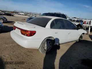 2001 Saturn SL z VIN 1G8ZK54771Z331414, wystawiony jako Copart lot #83895804 z przebiegiem 129 790 mil mil oraz Szkody całkowita. Historia ofert i sprzedaży dostępna na DreamBid. Obrazek 3.