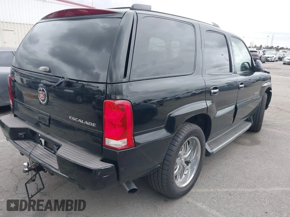2005 Cadillac Escalade z VIN 1GYEC63T95R181022, wystawiony jako IAAI lot #41777173 z przebiegiem 44 348 mil mil oraz . Historia ofert i sprzedaży dostępna na DreamBid. Obrazek 4.