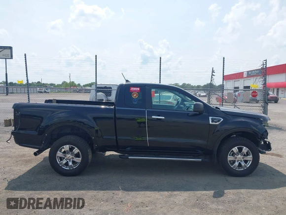 2019 Ford Ranger XL z VIN 1FTER1EHXKLA36781, wystawiony jako IAAI lot #42349085 z przebiegiem 39 311 mil mil oraz . Historia ofert i sprzedaży dostępna na DreamBid. Obrazek 14.