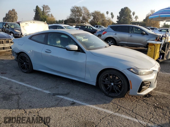 2022 BMW 4 Series 430i xDrive with VIN WBA73AP02NCK63692, listed as a Copart auction lot 84758794 with 21,484 mi miles and Salvage Title. Bid and sale history available at DreamBid. Image 4.