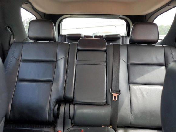 2017 Dodge Durango GT z VIN 1C4RDJDG2HC697898, wystawiony jako Copart lot #58571095 z przebiegiem 201 685 mil mil oraz Szkoda całkowita • Salvage title. Historia ofert i sprzedaży dostępna na DreamBid. Obrazek 10.