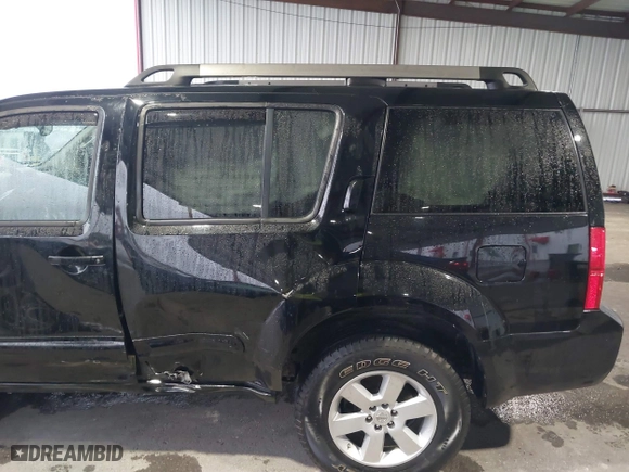 2011 Nissan Pathfinder LE with VIN 5N1AR1NB8BC633188, listed as a IAAI auction lot 41608356 with 128,377 mi miles. Bid and sale history available at carsss.com. Image 6.