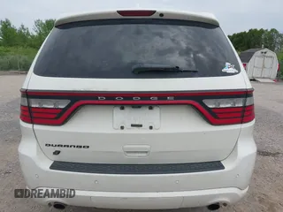 2019 Dodge Durango SXT Plus with VIN 1C4RDJAG0KC848670, listed as a IAAI auction lot 42480194 with 106,260 mi miles and . Bid and sale history available at DreamBid. Image 17.