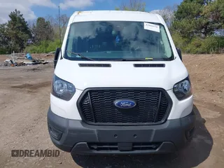 2021 Ford Transit Cargo with VIN 1FTBR1C85MKA66513, listed as a IAAI auction lot 42016528 with 18,174 mi miles and . Bid and sale history available at DreamBid. Image 12.