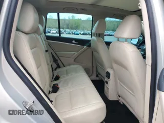 2013 Volkswagen Tiguan SE с VIN WVGBV7AXXDW548780, выставлен на аукционе Copart как лот 55157985 с пробегом 92 767 миль миль и Списание • Salvage title. История ставок и продаж доступна на DreamBid. Изображение 11.