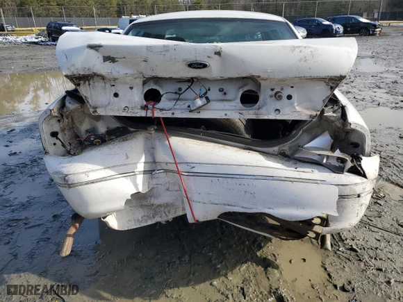 2003 Ford Police Interceptor Police Prep Pkg with VIN 2FAHP71W73X215400, listed as a Copart auction lot 45218005 with 209,554 mi miles and Salvage Title. Bid and sale history available at carsss.com. Image 6.