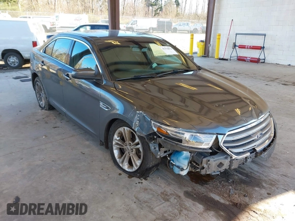 2018 Ford Taurus SEL with VIN 1FAHP2H82JG112785, listed as a IAAI auction lot 41376074 with 98,754 mi miles. Bid and sale history available at carsss.com. Image 1.