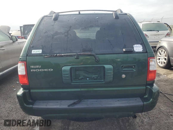 2002 Isuzu Rodeo S z VIN 4S2CK58W024333487, wystawiony jako Copart lot #76361854 z przebiegiem Nie podano mil oraz Nie do naprawy • Non repairable. Historia ofert i sprzedaży dostępna na DreamBid. Obrazek 6.