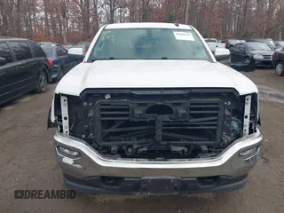 2017 GMC Sierra 1500 SLE z VIN 1GTV2MEC0HZ311932, wystawiony jako IAAI lot #40888769 z przebiegiem 72 676 mil mil oraz . Historia ofert i sprzedaży dostępna na DreamBid. Obrazek 12.