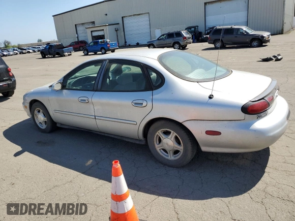 1999 Ford Taurus SE with VIN 1FAFP53U9XG171645, listed as a Copart auction lot 53187385 with 180,644 mi miles and Clean title. Bid and sale history available at DreamBid. Image 2.