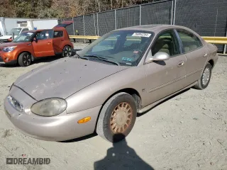 1999 Mercury Sable LS with VIN 1MEFM53S7XG602788, listed as a Copart auction lot 76894294 with 186,315 mi miles and Salvage Title. Bid and sale history available at carsss.com. Image 1.