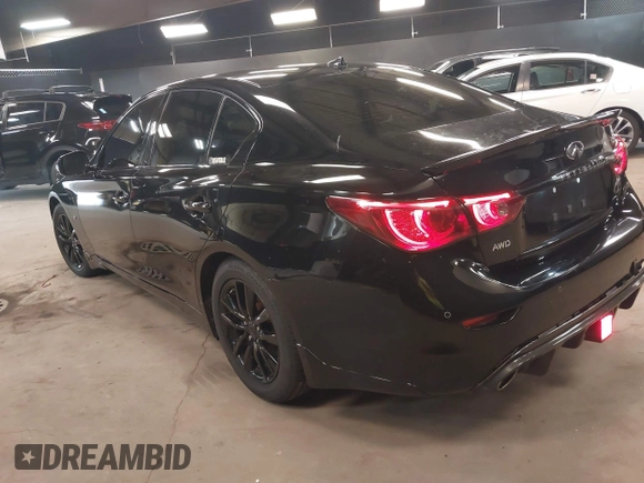 2014 Infiniti Q50 Sport with VIN JN1BV7AR0EM704993, listed as a IAAI auction lot 42492764 with 64,811 mi miles and . Bid and sale history available at DreamBid. Image 3.