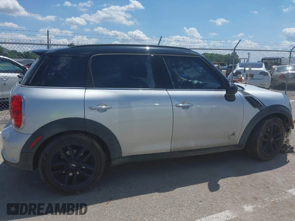 2011 MINI Countryman S with VIN WMWZC5C53BWL53641, listed as a IAAI auction lot 42547084 with 171,647 mi miles and . Bid and sale history available at DreamBid. Image 13.