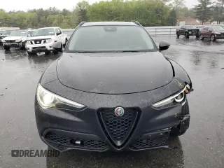 2020 Alfa Romeo Stelvio Ti z VIN ZASPAKBN9L7C94128, wystawiony jako Copart lot #56129775 z przebiegiem 54 042 mil mil oraz Szkody całkowita. Historia ofert i sprzedaży dostępna na DreamBid. Obrazek 5.
