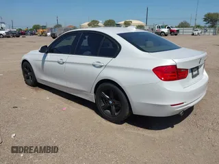 2014 BMW 3 Series 320i with VIN WBA3B1C53EP680072, listed as a IAAI auction lot 41996500 with 192,948 mi miles. Bid and sale history available at carsss.com. Image 3.