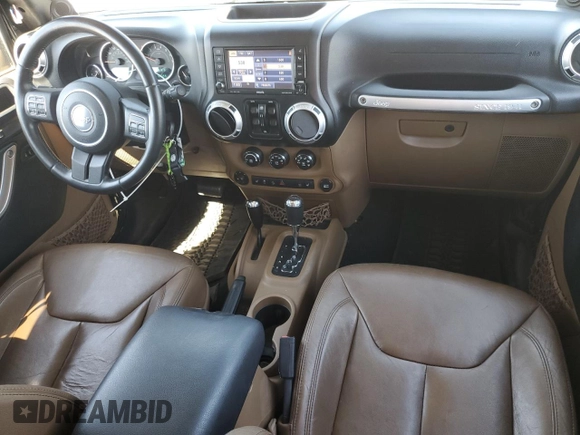 2013 Jeep Wrangler Unlimited Rubicon 10th Anniversary with VIN 1C4HJWFG4DL550832, listed as a Copart auction lot 71633684 with 60,759 mi miles and Salvage title. Bid and sale history available at DreamBid. Image 8.
