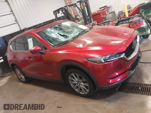 2020 Mazda CX-5 Grand Touring with VIN JM3KFBDMXL0840847, listed as a IAAI auction lot 41732185 with 36,248 mi miles. Bid and sale history available at carsss.com. Image 13.