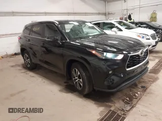 2023 Toyota Highlander L with VIN 5TDKDRAH8PS020610, listed as a IAAI auction lot 42076225 with 97,081 mi miles and . Bid and sale history available at DreamBid. Image 1.
