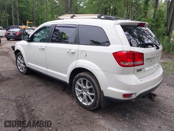 2015 Dodge Journey SXT with VIN 3C4PDCCG2FT690956, listed as a IAAI auction lot 42515701 with 145,676 mi miles and . Bid and sale history available at DreamBid. Image 3.