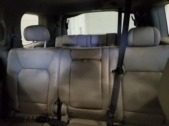 2009 Honda Pilot Touring z VIN 5FNYF48899B054320, wystawiony jako Copart lot #58948585 z przebiegiem 254 997 mil mil oraz Szkoda całkowita • Salvage title. Historia ofert i sprzedaży dostępna na DreamBid. Obrazek 10.