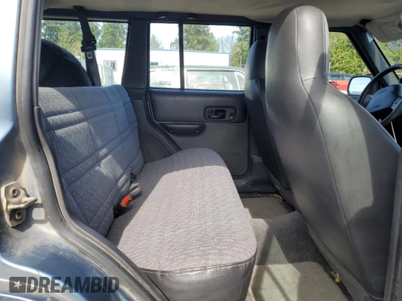 1999 Jeep Cherokee Sport с VIN 1J4FT68S3XL577599, выставлен на аукционе Copart как лот 50081715 с пробегом 182 974 миль миль и Чистый • Clean title. История ставок и продаж доступна на DreamBid. Изображение 11.