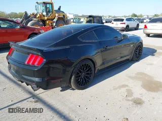 2015 Ford Mustang GT with VIN 1FA6P8CF4F5379607, listed as a IAAI auction lot 42039187 with 75,587 mi miles and . Bid and sale history available at carsss.com. Image 4.