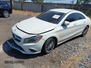 2014 Mercedes-Benz CLA 250 with VIN WDDSJ4GB0EN136231, listed as a IAAI auction lot 42046182 with 94,729 mi miles and . Bid and sale history available at DreamBid. Image 2.