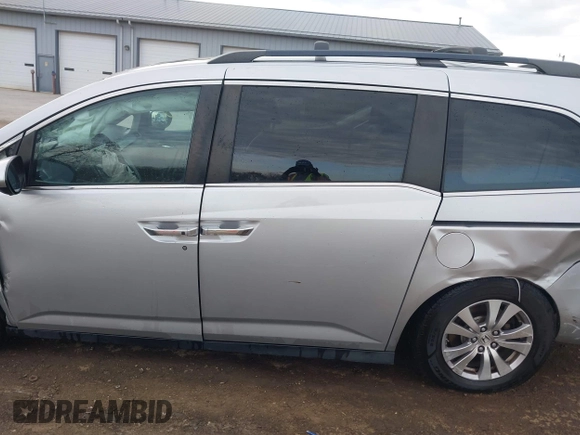 2014 Honda Odyssey EX-L with VIN 5FNRL5H65EB096544, listed as a IAAI auction lot 41903451 with 99,628 mi miles and . Bid and sale history available at carsss.com. Image 14.